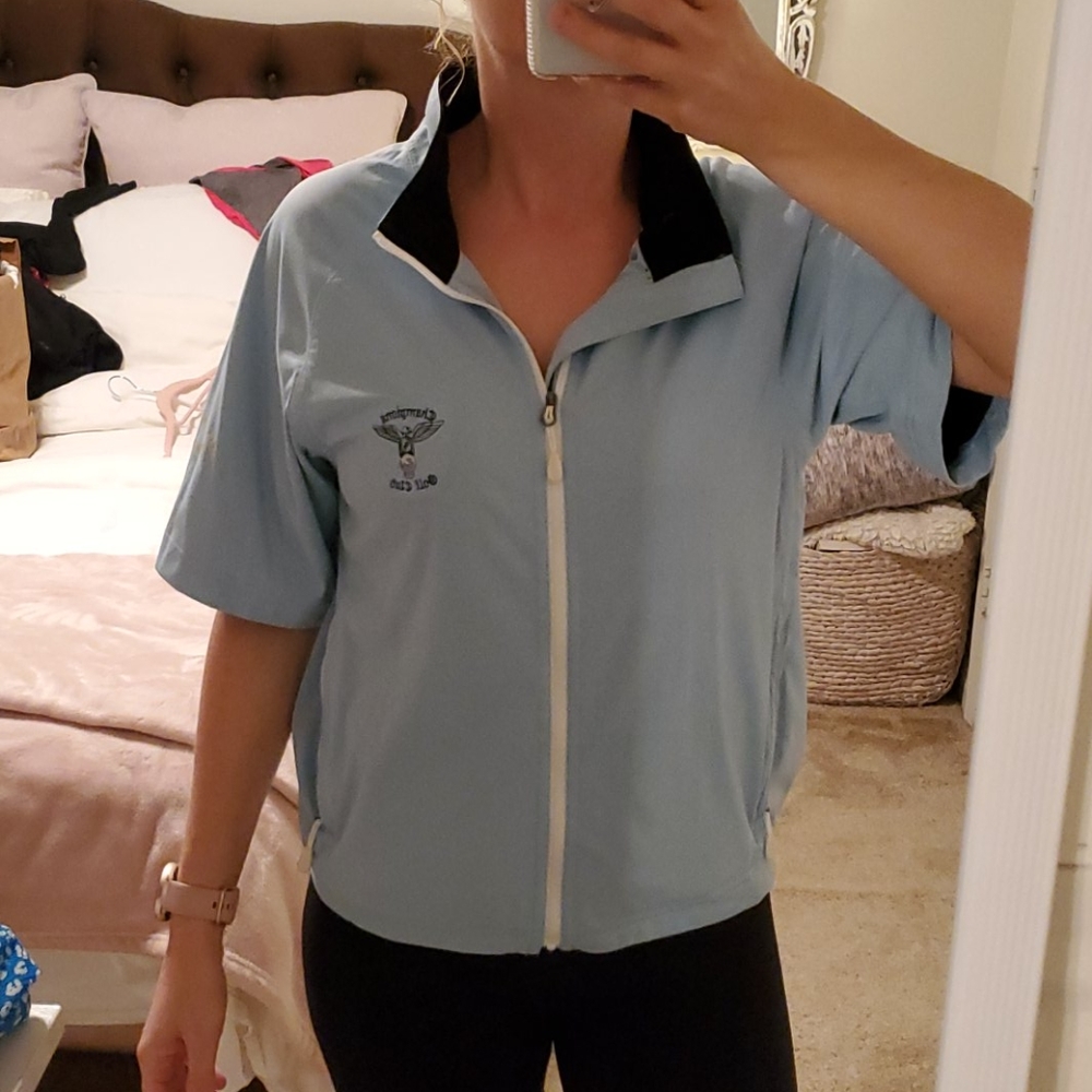 Blue short sleeve jacket.  Polo size small